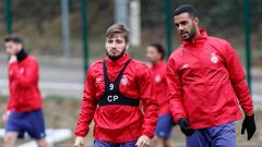 Cristian Portugues y Jon&aacute;s Ramalho durante un entrenamiento del Girona.