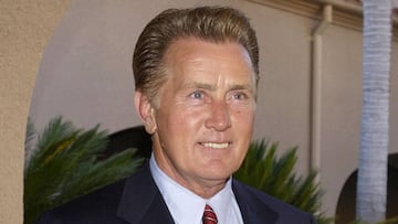 FILE PHOTO: Actor Martin Sheen, who stars in the television series "The West Wing", poses as he arrives at the NBC All-Star Party held for the nation's TV critics as part of the TCA Press Tour in Pasadena, California July 24, 2002. REUTERS