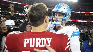 SANTA CLARA, CALIFORNIA - DECEMBER 30: Brock Purdy #13 of the San Francisco 49ers and Jared Goff #16 of the Detroit Lions embrace after the game at Levi's Stadium on December 30, 2024 in Santa Clara, California. Ezra Shaw/Getty Images/AFP (Photo by EZRA SHAW / GETTY IMAGES NORTH AMERICA / Getty Images via AFP)