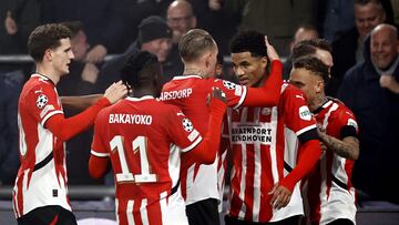 PSV Eindhoven's US midfielder #07 Malik Tillman (2nd-R) celebrates scoring his team's second goal during the UEFA Champions League, League phase - Matchday 4 football match between PSV Eindhoven and Girona FC at the PSV Stadium in Eindhoven on November 5, 2024. (Photo by MAURICE VAN STEEN / ANP / AFP) / Netherlands OUT