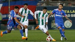 El jugador de O'Higgins, Matias Marin, disputa el balón con Yonathan Andia de Universidad de Chile.