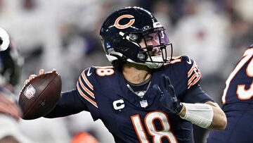 MINNEAPOLIS, MINNESOTA - DECEMBER 16: Caleb Williams #18 of the Chicago Bears throws a pass during the third quarter against the Minnesota Vikings at U.S. Bank Stadium on December 16, 2024 in Minneapolis, Minnesota. Stephen Maturen/Getty Images/AFP (Photo by Stephen Maturen / GETTY IMAGES NORTH AMERICA / Getty Images via AFP)