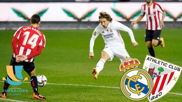 Luka Modric intenta sortear a Dani García en un pase durante el Real Madrid-Athletic de la semifinal de la Supercopa de España.