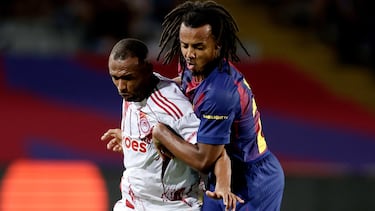BARCELONA, SPAIN - OCTOBER 21: (L-R) Ayoub El Kaabi of Olympiacos Piraeus, Jules Kounde of FC Barcelona during the UEFA Champions League match between FC Barcelona v Olympiakos Piraeus at the Lluis Companys Olympic Stadium on October 21, 2025 in Barcelona Spain (Photo by David Ramirez/Soccrates/Getty Images)