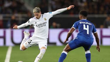 Real Madrid's Uruguayan midfielder Federico Valverde (L) is marked by Hilal's Saudi defender Khalifah al-Dawsari during the FIFA Club World Cup final football match between Spain's Real Madrid and Saudi Arabia's Al-Hilal at the Prince Moulay Abdellah Stadium in Rabat on February 11, 2023. (Photo by Fadel Senna / AFP)
