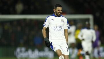 Leicester's Riyad Mahrez holds his leg