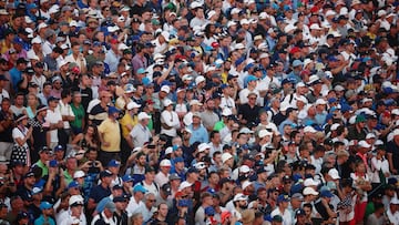 Golf - The 2023 Ryder Cup - Marco Simone Golf & Country Club, Rome, Italy - September 30, 2023 Fans watch the action on the 18th hole during the Four-Balls REUTERS/Guglielmo Mangiapane