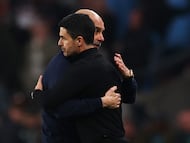 Soccer Football - Carabao Cup - Final - Arsenal v Manchester City - Wembley Stadium, London, Britain - March 22, 2026 Manchester City manager Pep Guardiola embraces Arsenal manager Mikel Arteta after winning the Carabao Cup Action Images via Reuters/Matthew Childs EDITORIAL USE ONLY. NO USE WITH UNAUTHORIZED AUDIO, VIDEO, DATA, FIXTURE LISTS, CLUB/LEAGUE LOGOS OR 'LIVE' SERVICES. ONLINE IN-MATCH USE LIMITED TO 120 IMAGES, NO VIDEO EMULATION. NO USE IN BETTING, GAMES OR SINGLE CLUB/LEAGUE/PLAYER PUBLICATIONS. PLEASE CONTACT YOUR ACCOUNT REPRESENTATIVE FOR FURTHER DETAILS..