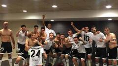 The Valencia players take a group photo after beating Barcelona