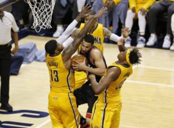 Cory Joseph, Paul George y Myles Turner.