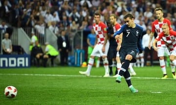 Thanks VAR | France's Antoine Griezmann strokes home the penalty.