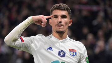 Lyon&#039;s French midfielder Houssem Aouar celebrates after scoring the opener during the French Cup quarter-final football match between Olympique Lyonnais and Olympique de Marseille at the Groupama stadium in Decines-Charpieu near Lyon, central eastern