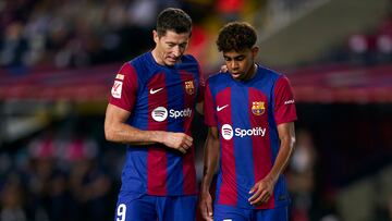 BARCELONA, SPAIN - SEPTEMBER 16: Robert Lewandowski and Lamine Yamal of FC Barcelona converses during the LaLiga EA Sports match between FC Barcelona and Real Betis at Estadi Olimpic Lluis Companys on September 16, 2023 in Barcelona, Spain. (Photo by Pedro Salado/Quality Sport Images/Getty Images)