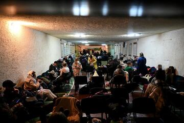 Women, children and senior citizens in an air raid shelter in Kyiv.