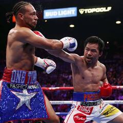 Pacquiao, más leyenda: frena a Thurman y es campeón a los 40