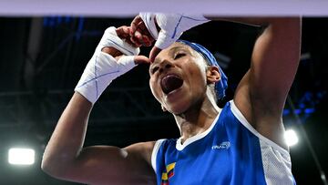 Colombia's Ingrit Lorena Valencia Victoria celebrates after winning against Australia's Monique Suraci in the women's 50kg preliminaries round of 16 boxing match during the Paris 2024 Olympic Games at the North Paris Arena, in Villepinte on August 1, 2024. (Photo by MOHD RASFAN / AFP) (Photo by MOHD RASFAN/AFP via Getty Images)
