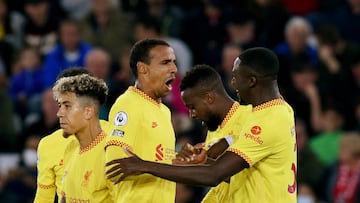 Jürgen Klopp’s quadruple-chasing Liverpool side kept their hopes alive in the Premier League with a leveller from Minamino and a winner from Matip.