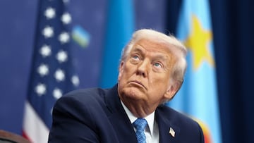 U.S. President Donald Trump looks on during a signing ceremony with President of the Democratic Republic of the Congo Felix Tshisekedi and President of Rwanda Paul Kagame (not pictured) at the U.S. Institute of Peace in Washington, D.C., U.S., December 4, 2025. REUTERS/Kevin Lamarque