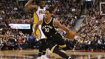 Mar 31, 2017; Toronto, Ontario, CAN; Toronto Raptors guard DeMar DeRozan (10) dribbles past Indiana Pacers forward CJ Miles (0) at the Air Canada Centre. Toronto defeated Indiana 111-100. Mandatory Credit: John E. Sokolowski-USA TODAY Sports