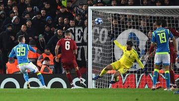 Liverpool&#039;s Brazilian goalkeeper Alisson Becker (2R) saves a shot from Napoli&#039;s Polish striker Arkadiusz Milik (L) during the UEFA Champions League group C football match between Liverpool and Napoli at Anfield stadium in Liverpool, north west E