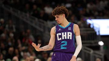 MILWAUKEE, WISCONSIN - DECEMBER 01: LaMelo Ball #2 of the Charlotte Hornets reacts to a three point shot during the second half of a game against the Milwaukee Bucks at Fiserv Forum on December 01, 2021 in Milwaukee, Wisconsin. NOTE TO USER: User expressly acknowledges and agrees that, by downloading and or using this photograph, User is consenting to the terms and conditions of the Getty Images License Agreement.   Stacy Revere/Getty Images/AFP
 == FOR NEWSPAPERS, INTERNET, TELCOS &amp; TELEVISION USE ONLY ==