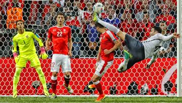 Football Soccer - Switzerland v France - EURO 2016 - Group A - Stade Pierre-Mauroy, Lille, France - 19/6/16
 France&#039;s Adil Rami fouls Switzerland&#039;s Admir Mehmedi resulting in a yellow card
 REUTERS/Gonzalo Fuentes
 Livepic