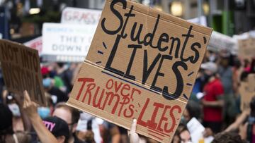 New York (United States), 04/08/2020.- People gather for a protest and march, part of a nationwide movement organized by teachers, students, and parents, against plans to reopen schools in the midst of the coronavirus pandemic, in New York, New York, USA,