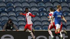 GLASGOW, SCOTLAND - MARCH 18: Peter Olayinka of Slavia Praha celebrates after scoring their side&#039;s first goal during the UEFA Europa League Round of 16 Second Leg match between Rangers and Slavia Praha at Ibrox Stadium on March 18, 2021 in Glasgow, S