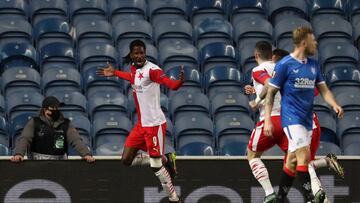 GLASGOW, SCOTLAND - MARCH 18: Peter Olayinka of Slavia Praha celebrates after scoring their side&#039;s first goal during the UEFA Europa League Round of 16 Second Leg match between Rangers and Slavia Praha at Ibrox Stadium on March 18, 2021 in Glasgow, S