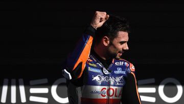 Red Bull KTM Tech 3's Portuguese rider Miguel Oliveira celebrates after winning the MotoGP race of the Portuguese Grand Prix at the Algarve International Circuit in Portimao on November 22, 2020. (Photo by PATRICIA DE MELO MOREIRA / AFP)