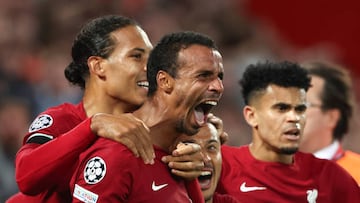 Joel Matip of Liverpool celebrates after scoring a goal to make it 2-1.