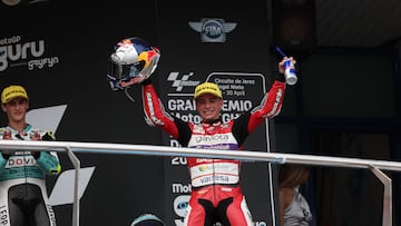 Second placed GASGAS' Spanish rider David Alonso celebrates on the podium after the Moto3 race of the Spanish Grand Prix at the Jerez Circuit in Jerez de la Frontera on April 30, 2023. (Photo by Pierre-Philippe MARCOU / AFP) (Photo by PIERRE-PHILIPPE MARCOU/AFP via Getty Images)