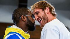 Former world welterweight king Floyd Mayweather (L) and YouTube personality Logan Paul face-off during the media availability ahead of their June 6 exhibition boxing match, on June 3, 2021 at Villa Casa Casuarina at the former Versace Mansion in Miami Bea