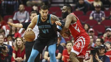 Mar 11, 2019; Houston, TX, USA; Charlotte Hornets center Willy Hernangomez (41) dribbles the ball against Houston Rockets guard James Harden (13) during the first quarter at Toyota Center. Mandatory Credit: Troy Taormina-USA TODAY Sports
