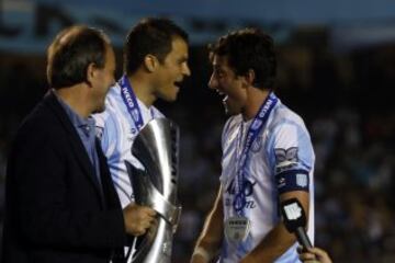 Diego Milito y Sebastian Saja.