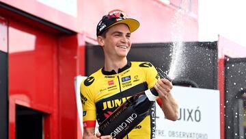 Team Jumbo-Visma's US rider Sepp Kuss celebrates on the podium after winning the sixth stage of the 2023 La Vuelta cycling tour of Spain, a 183,1 km race from La Vall d'Uixo to Alto de Javalambre, on August 31, 2023. (Photo by JOSE JORDAN / AFP)