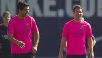 Luis Su&aacute;rez y Messi, durante un entrenamiento del Barcelona.