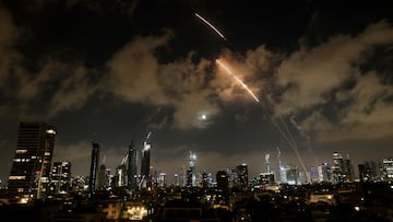 An anti-missile system operates as missiles are launched from Iran, as seen from Tel Aviv, Israel, June 18, 2025. REUTERS/Violeta Santos Moura
