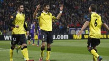 Rakitic celebra con Carriço e Iborra el 1-2.