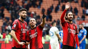 Soccer Football - Serie A - AC Milan v Empoli - San Siro, Milan, Italy - March 10, 2024 AC Milan's Olivier Giroud, Ismael Bennacer and Yacine Adli celebrate with fans after the match REUTERS/Alessandro Garofalo