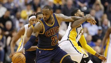 Feb 8, 2017; Indianapolis, IN, USA; Cleveland Cavaliers forward LeBron James (23) is guarded by Indiana Pacers forward Paul George (13) at Bankers Life Fieldhouse. Cleveland defeated Indiana 132-117. Mandatory Credit: Brian Spurlock-USA TODAY Sports