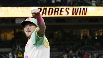 SAN DIEGO, CA - OCTOBER 1: Jake Cronenworth #9 of the San Diego Padres celebrates after the Padres beat the Chicago White Sox 5-2 in a baseball game October 1, 2022 at Petco Park in San Diego, California.   Denis Poroy/Getty Images/AFP