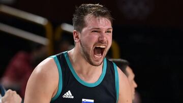Slovenia&#039;s Luka Doncic reacts after a point in the men&#039;s semi-final basketball match between France and Slovenia during the Tokyo 2020 Olympic Games at the Saitama Super Arena in Saitama on August 5, 2021. (Photo by Aris MESSINIS / AFP)