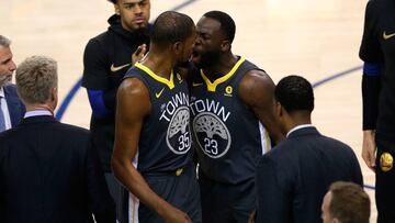 OAKLAND, CA - JUNE 03: Draymond Green #23 of the Golden State Warriors reacts with Kevin Durant #35 against the Cleveland Cavaliers during the first quarter in Game 2 of the 2018 NBA Finals at ORACLE Arena on June 3, 2018 in Oakland, California. NOTE TO USER: User expressly acknowledges and agrees that, by downloading and or using this photograph, User is consenting to the terms and conditions of the Getty Images License Agreement.   Lachlan Cunningham/Getty Images/AFP
 == FOR NEWSPAPERS, INTERNET, TELCOS &amp; TELEVISION USE ONLY ==