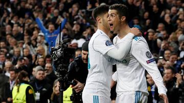 Soccer Football - Champions League Round of 16 First Leg - Real Madrid vs Paris St Germain - Santiago Bernabeu, Madrid, Spain - February 14, 2018   Real Madrid&rsquo;s Cristiano Ronaldo celebrates scoring their second goal with Marco Asensio   REUTERS/Pau