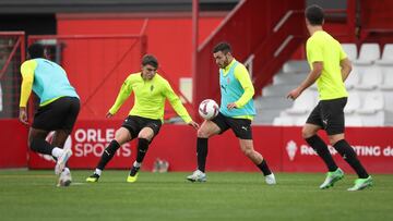 Víctor Campuzano y Pablo García, en el entrenamiento del Sporting.