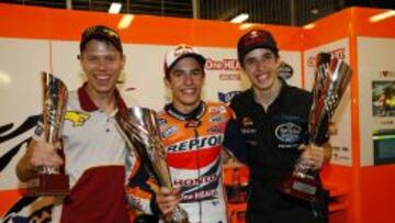 Los tres ganadores en Montmeló, Tito Rabat y los hermanos Márquez.