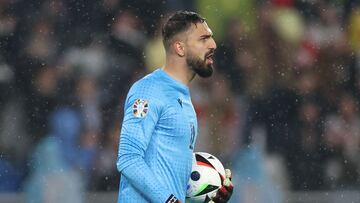 Georgia's goalkeeper #12 Giorgi Mamardashvili celebrates after winning the UEFA EURO 2024 qualifying play-off football match between Georgia and Luxembourg in Tbilisi on March 21, 2024. (Photo by Giorgi ARJEVANIDZE / AFP)