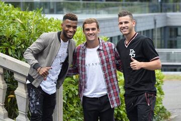 Thomas Lemar, Antoine Griezmann and Lucas Hernández arrive for training with France in Etival-Clairefontaine today.