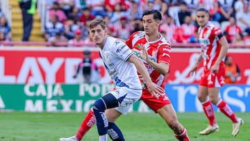 Facundo Waller (L) of Puebla fights for the ball with Fernando Arce (L) of Necaxa during the 2nd round match between Necaxa and Puebla as part of the Liga BBVA MX, Torneo Apertura 2024 at Victoria Stadium on July 13, 2024 in Aguascalientes, Mexico.
